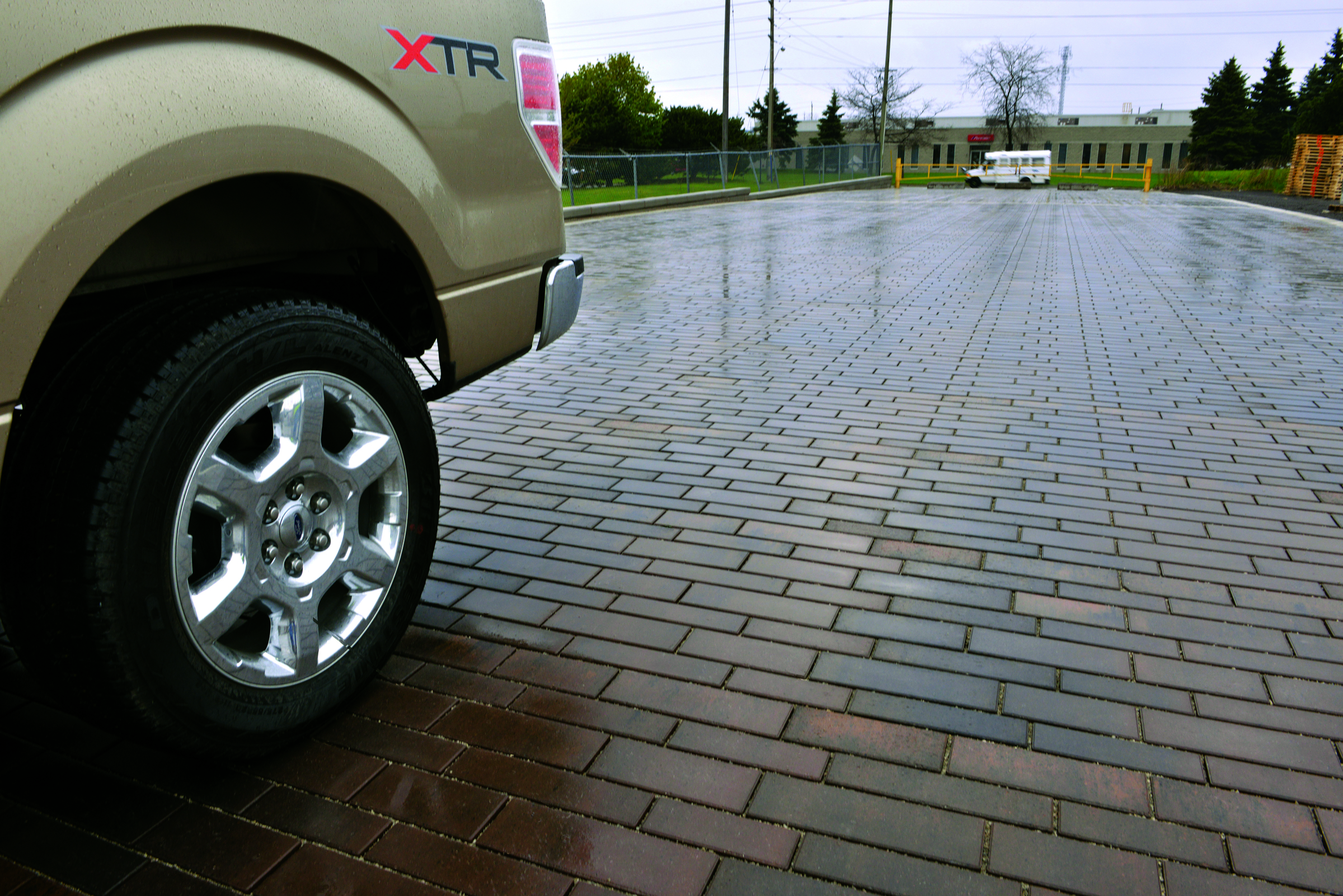 Truck tires on Eco-Line Permeable Pavers in the rain