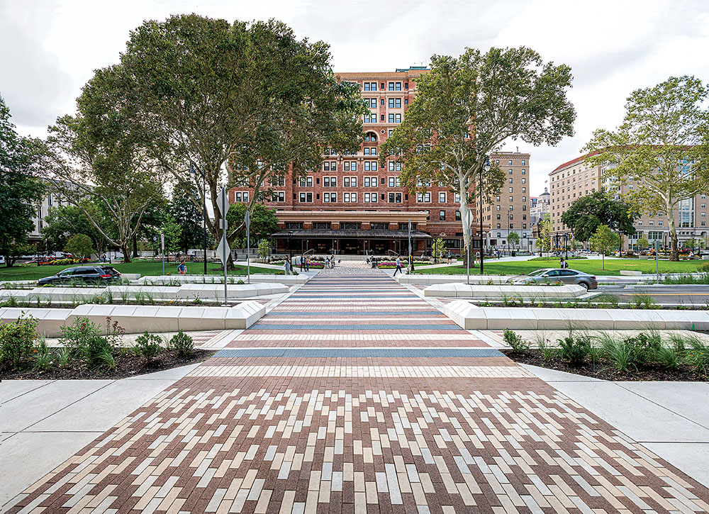 colorful paving patterns made from promenade plank and eco-promenade pavers lead to the student union at the university of pittsburgh.
